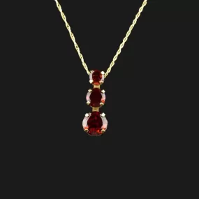 10K Gold Garnet Journey Pendant Necklace